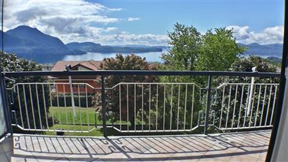 Продается трехкомнатная квартира в Ариццано с видом на озеро с гаражом и террасой
